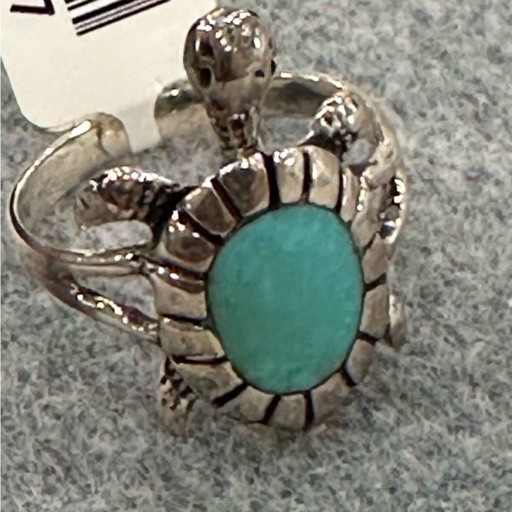 Sterling Silver.
Genuine TQ Turtle Ring